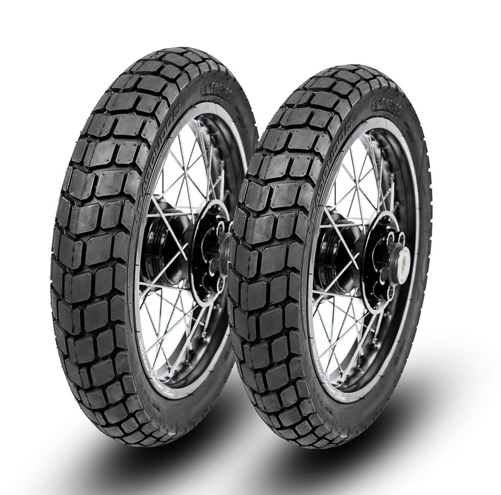 Par de Pneus 120/80-18 + 90/90-21 Parrudo G2 Cinborg, mostrando os pneus em um fundo neutro. Ideal para motos XR250 e XRE300, com construção robusta e certificação do Inmetro.